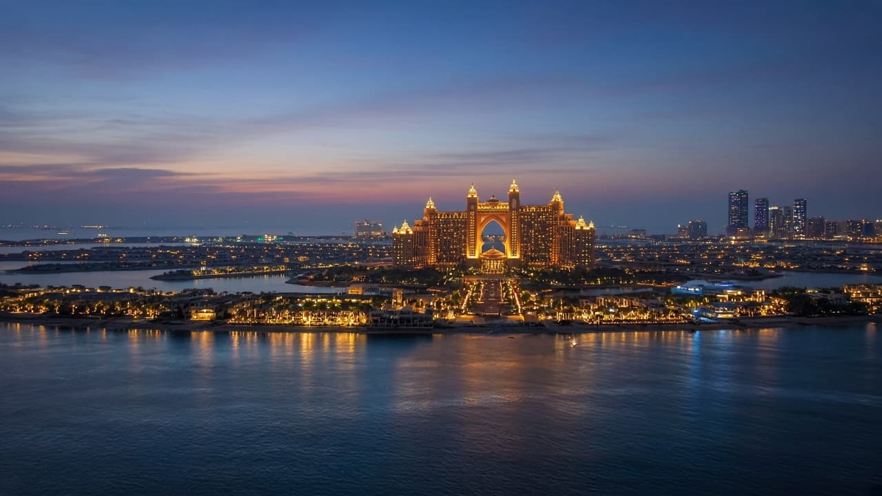 Palm Jumeirah glowing at blue hour