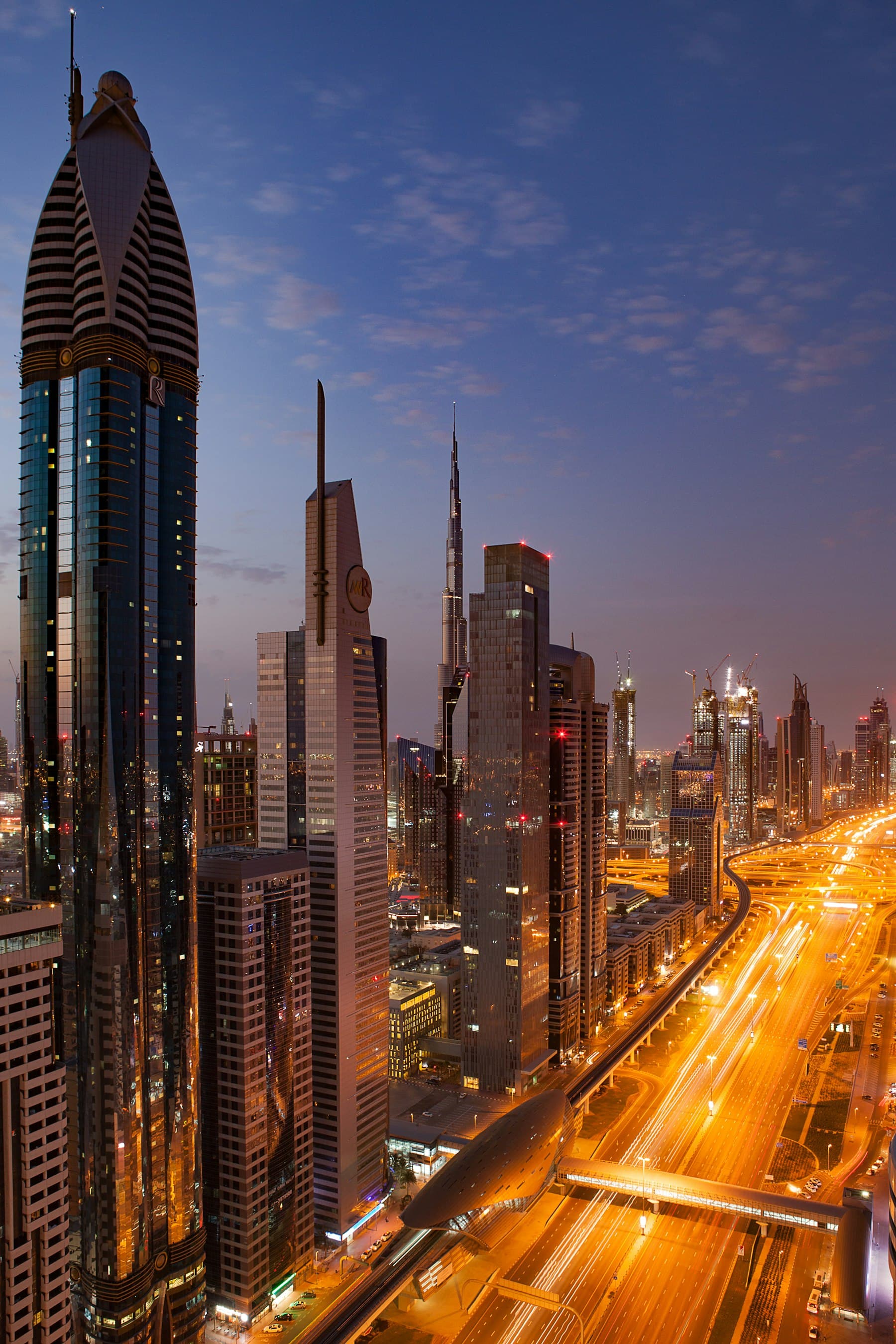 Dubai skyline at night along Sheikh Zayed Road